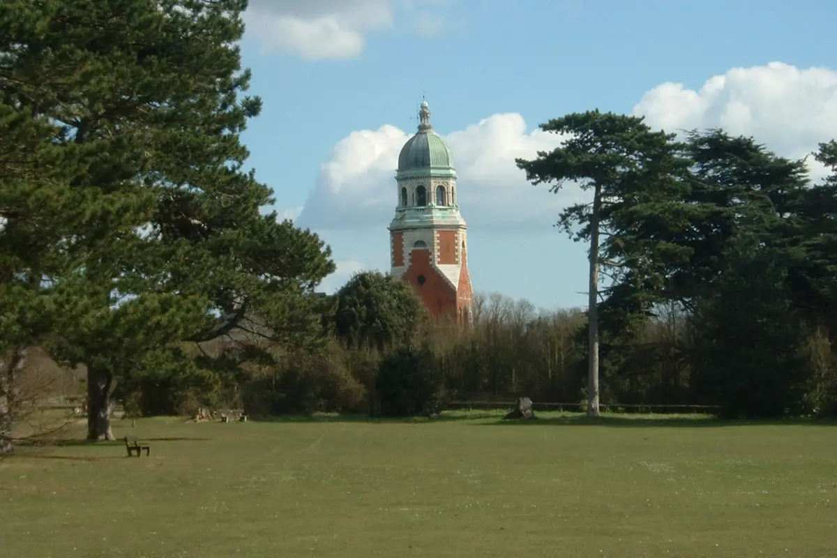 The chapel tower rising above the lawns of Royal Victoria Country Park